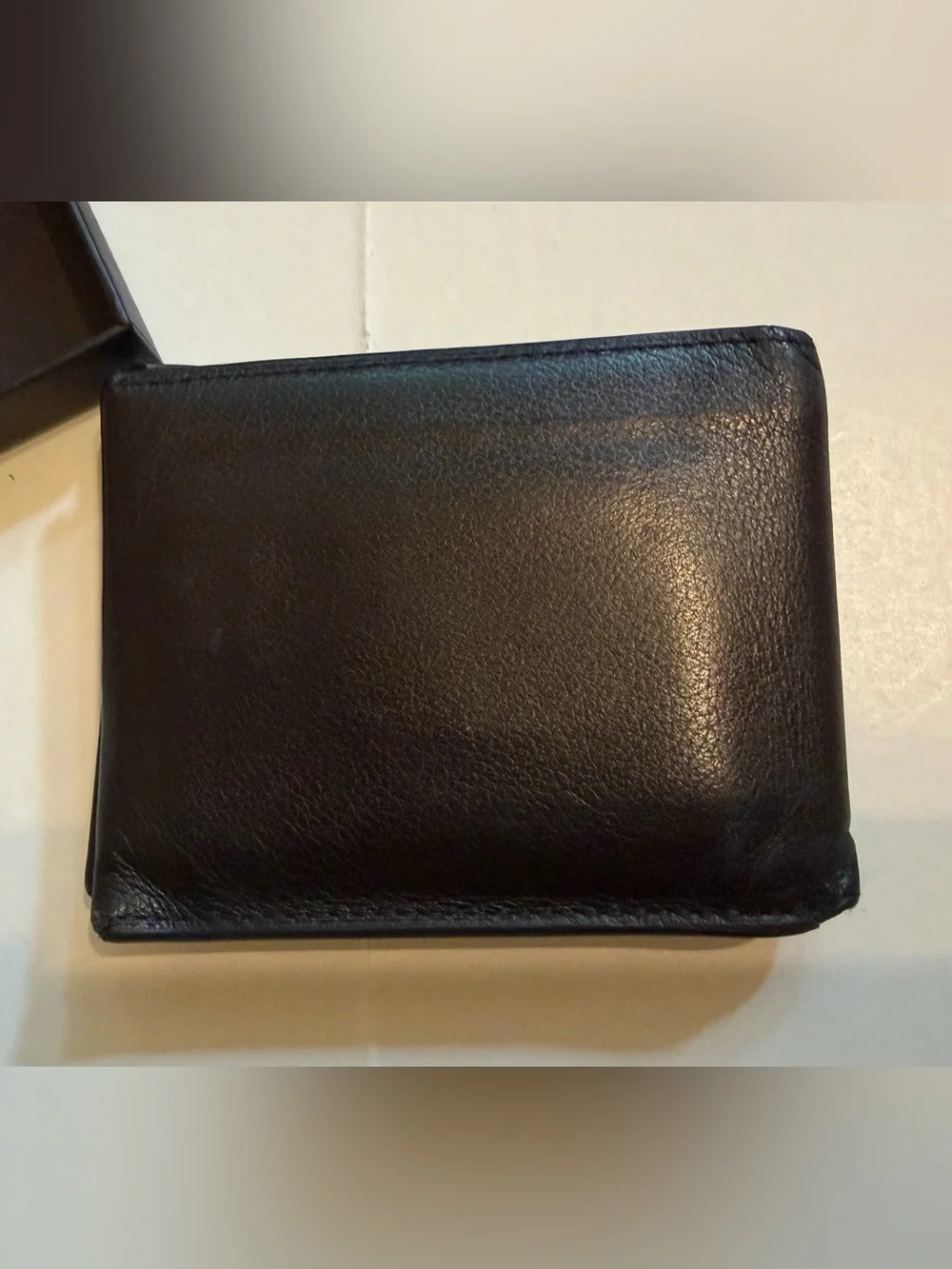 Men’s Tumi black bifold wallet, good condition